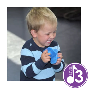Three year old enjoying kindermusik