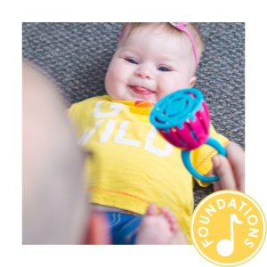 A baby enjoying kindermusik